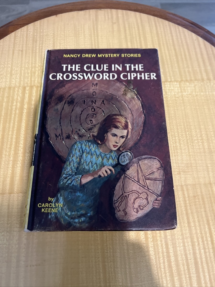 designer gucci crossword clue